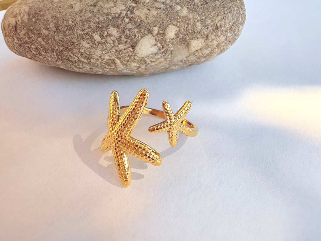 Bague double étoile de mer dorée - vue fond blanc