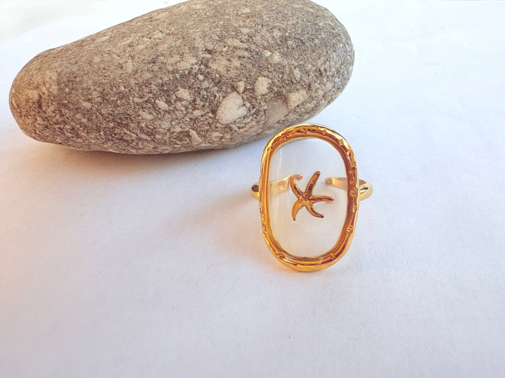 Bague cadre ovale doré et étoile de mer - portée