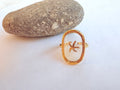 Bague cadre ovale doré et étoile de mer - portée
