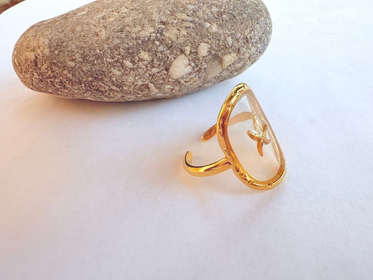 Bague cadre ovale doré et étoile de mer - vue face