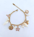 Bracelet breloques marines rose et perles nacrées - vue 1