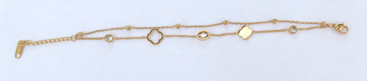 Bracelet double rang trèfle et strass doré - porté