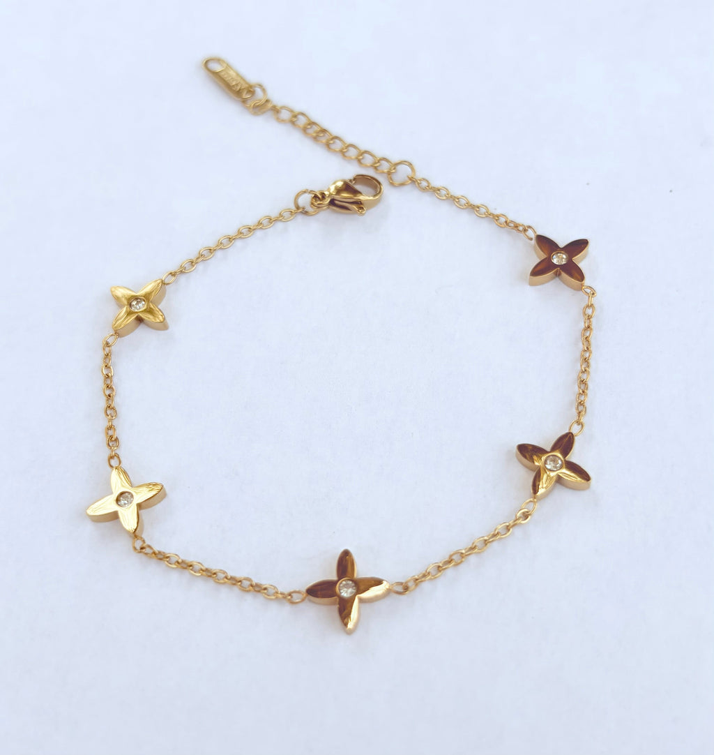 Bracelet chaîne étoiles à 4 branches et strass - vue 1